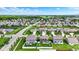 A beautiful neighborhood aerial view with manicured lawns and mature trees that create a serene community environment at 1286 Brookdale Ct, Franklin, IN 46131