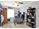 Charming bedroom with a ceiling fan, sports decor, a work desk, and a bookshelf for a cozy, personalized space at 1286 Brookdale Ct, Franklin, IN 46131