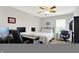 This bedroom features a comfortable bed and a dedicated workspace with a desk, computer, and ergonomic chair at 1286 Brookdale Ct, Franklin, IN 46131