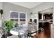 The dining area offers ample natural light and seamless access to the kitchen area at 1286 Brookdale Ct, Franklin, IN 46131