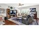 Cozy living room with plush seating, area rug, and lots of natural light at 1286 Brookdale Ct, Franklin, IN 46131