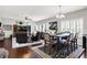 Open living space featuring living room and dining area with lots of natural light at 1286 Brookdale Ct, Franklin, IN 46131