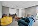 Basement with a projector and screen, plus comfortable seating at 12945 E 100 N, Columbus, IN 47203