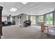 Large basement with media setup and desk space, plus walkout to yard at 12945 E 100 N, Columbus, IN 47203