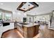 Spacious kitchen with a center island, open layout, and stainless steel appliances at 12945 E 100 N, Columbus, IN 47203