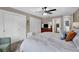 Spacious main bedroom with a view of ensuite, generous closet space, and soft natural light at 12945 E 100 N, Columbus, IN 47203