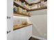 Pantry featuring custom wood shelving and cabinet storage at 12945 E 100 N, Columbus, IN 47203
