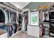 Spacious walk-in closet with custom shelving and natural lighting at 12945 E 100 N, Columbus, IN 47203