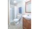 Bright bathroom with a shower/tub and a wood vanity with sink at 1603 Quinn Creek Dr, Brownsburg, IN 46112