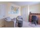 Sitting room with a rolltop desk, comfy chairs, and a map on the wall at 1603 Quinn Creek Dr, Brownsburg, IN 46112