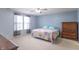 Comfortable bedroom with a bed, dresser, and soft, natural lighting at 1603 Quinn Creek Dr, Brownsburg, IN 46112