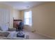 Sitting room with a rolltop desk and two comfy armchairs at 1603 Quinn Creek Dr, Brownsburg, IN 46112