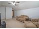 Comfortable living area with neutral decor and plush seating arrangement at 1603 Quinn Creek Dr, Brownsburg, IN 46112