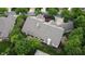 Expansive home features a well-maintained roof, lush landscaping, and mature trees at 1614 Rosebud Ln # 83, Greenwood, IN 46143