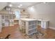 Large bonus room with ample storage, natural light, and flexible workspace at 1614 Rosebud Ln # 83, Greenwood, IN 46143