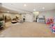 Spacious finished basement with ample natural light and plenty of room for activities at 165 N Bend Dr, Greenwood, IN 46142