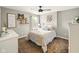 Charming bedroom featuring a decorative bed frame, soft carpet, and plenty of natural light at 165 N Bend Dr, Greenwood, IN 46142
