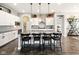 Bright kitchen with white cabinets, granite countertops, and pendant lighting over a large island at 165 N Bend Dr, Greenwood, IN 46142