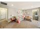Spacious living room featuring plush seating, neutral tones, and bright, natural light at 165 N Bend Dr, Greenwood, IN 46142