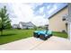 Backyard featuring an outdoor seating area, well-manicured lawn, and black fence at 17696 Arryne E Dr, Noblesville, IN 46062