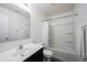 Clean bathroom featuring a shower-tub combo with white shower curtain, vanity and toilet at 17696 Arryne E Dr, Noblesville, IN 46062