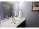Bathroom featuring a white vanity, modern sink, and framed mirror at 17696 Arryne E Dr, Noblesville, IN 46062