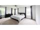 Spacious primary bedroom with neutral walls, carpet, and many windows at 17696 Arryne E Dr, Noblesville, IN 46062
