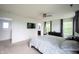 Primary bedroom featuring neutral walls, carpet, and a ceiling fan at 17696 Arryne E Dr, Noblesville, IN 46062
