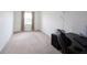 Bedroom featuring neutral walls, carpet, and a black desk with office chair at 17696 Arryne E Dr, Noblesville, IN 46062