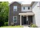 Close up of the home's entrance, showing the address number and covered porch at 17696 Arryne E Dr, Noblesville, IN 46062