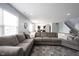 Inviting living room with a large sectional sofa and neutral color palette at 17696 Arryne E Dr, Noblesville, IN 46062