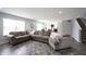 Living room view showcases an open layout that connects to the kitchen and dining area at 17696 Arryne E Dr, Noblesville, IN 46062