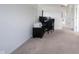 Upstairs office with a black desk and natural light at 17696 Arryne E Dr, Noblesville, IN 46062