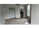 A bright living room with updated flooring and fresh paint, awaiting personalization and decor at 1802 Woodlawn Ave, Indianapolis, IN 46203