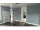 Neutral living room featuring classic radiators and hardwood flooring, providing a warm and inviting atmosphere at 1802 Woodlawn Ave, Indianapolis, IN 46203