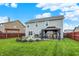 Backyard featuring a patio, pergola, manicured lawn, privacy fence, and ample space for outdoor enjoyment at 18258 Rickety Dr, Westfield, IN 46074