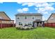 Expansive backyard with lush lawn, patio seating area, gazebo, and swing set at 18258 Rickety Dr, Westfield, IN 46074