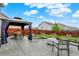 Relaxing backyard with a patio, gazebo, firepit, and seating for entertaining guests in the outdoor space at 18258 Rickety Dr, Westfield, IN 46074
