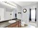 Neutral bathroom featuring a sink, toilet, shower and walk-in closet at 18258 Rickety Dr, Westfield, IN 46074