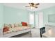 Bright bedroom featuring gray carpet, a daybed covered in throw pillows, and white window blinds at 18258 Rickety Dr, Westfield, IN 46074