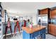 Open kitchen area with a breakfast bar that provides a view into the connected living area at 18258 Rickety Dr, Westfield, IN 46074