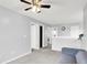 Upstairs loft area that leads to multiple rooms and has gray walls and carpet at 18258 Rickety Dr, Westfield, IN 46074