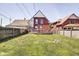Spacious backyard featuring a deck and a large grassy area, perfect for outdoor activities and relaxation at 1867 Barth Ave, Indianapolis, IN 46203