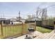 Relaxing deck area with grill, overlooking a spacious backyard at 1867 Barth Ave, Indianapolis, IN 46203