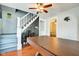 Dining area with stairs to upper level and doorway to bedroom at 1867 Barth Ave, Indianapolis, IN 46203