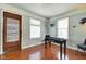 Cozy game room with hardwood floors, bright natural light, and a foosball table at 1867 Barth Ave, Indianapolis, IN 46203