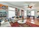 Bright living room with stylish decor, comfortable sofas, and large windows at 1867 Barth Ave, Indianapolis, IN 46203