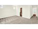 Bedroom featuring a window and carpet flooring with open doorway to the bathroom at 19725 Highclere Lane, Sheridan, IN 46069