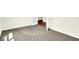 Bedroom with gray carpet, a white door, and light walls at 19725 Highclere Lane, Sheridan, IN 46069