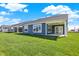 Backyard with green grass and blue siding on the home at 19762 Highclere Lane, Sheridan, IN 46069